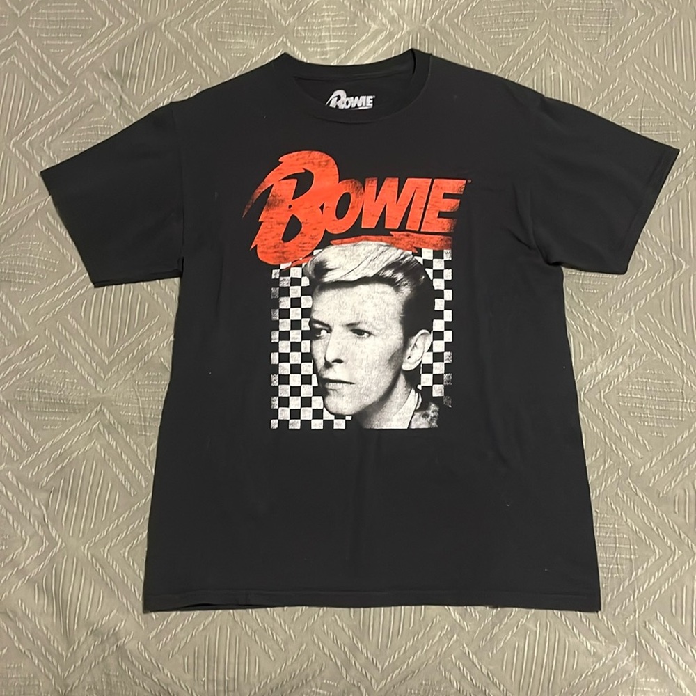 The brand is Bowie, 100% cotton, offically licensed